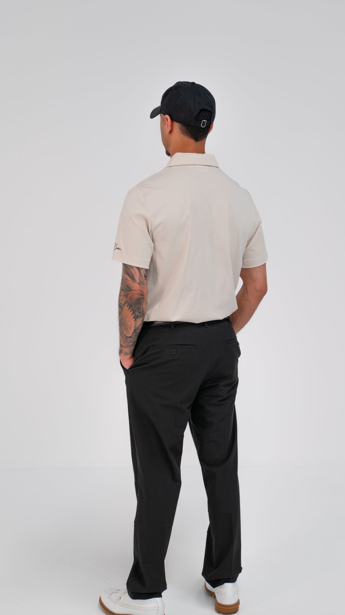 Le Classique Polo in cream, worn on model, back view