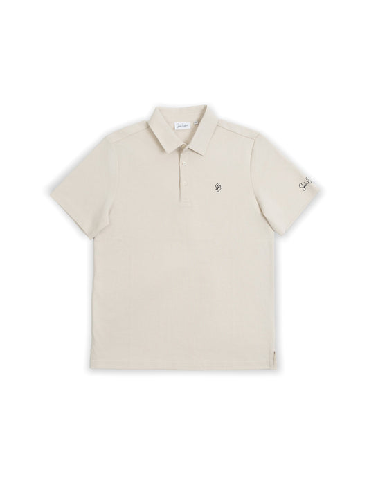 Le Classique Polo in cream by Saalor Couture, flat lay